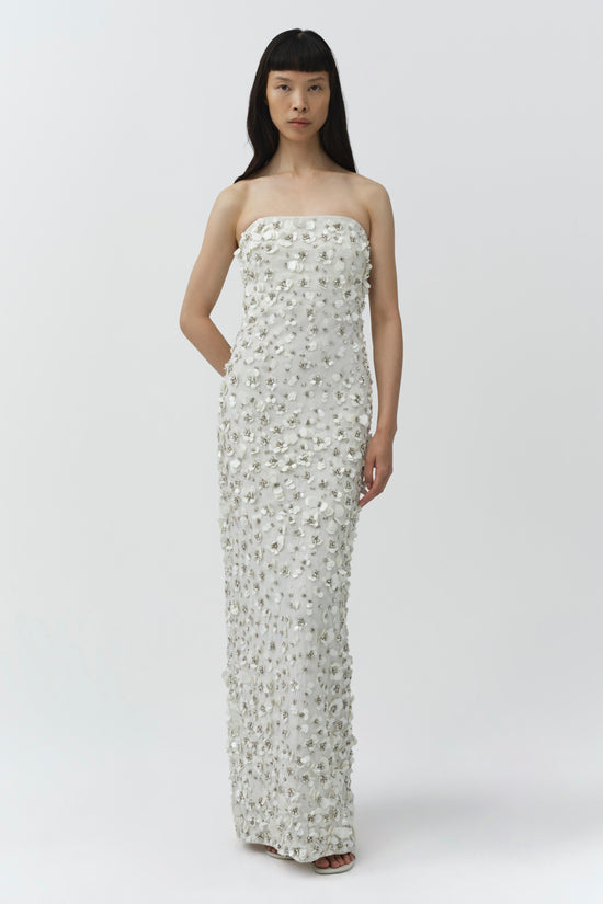 White strapless floor-length gown with silver beaded embellishments throughout.