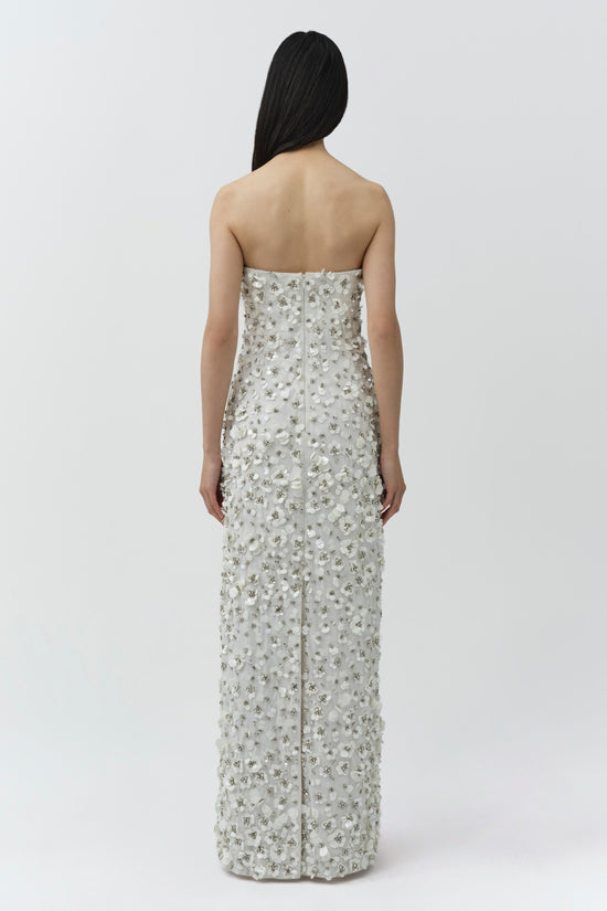 Strapless ivory gown with silver beaded embellishments throughout, shown from back view.