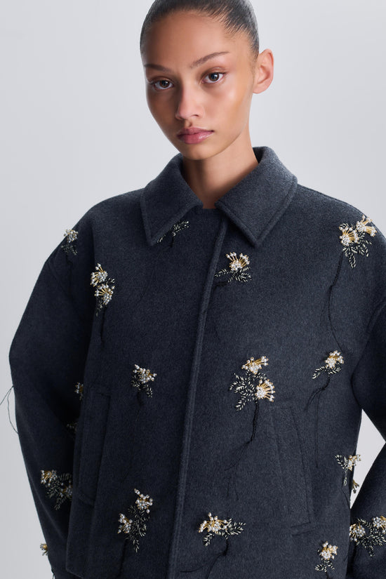 Charcoal wool jacket with gold and silver floral embellishments scattered across front, sleeves, and back.