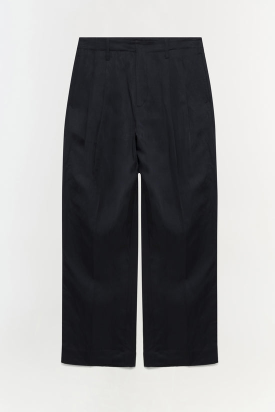 Black wide-leg trousers with pleated front and full-length straight cut.