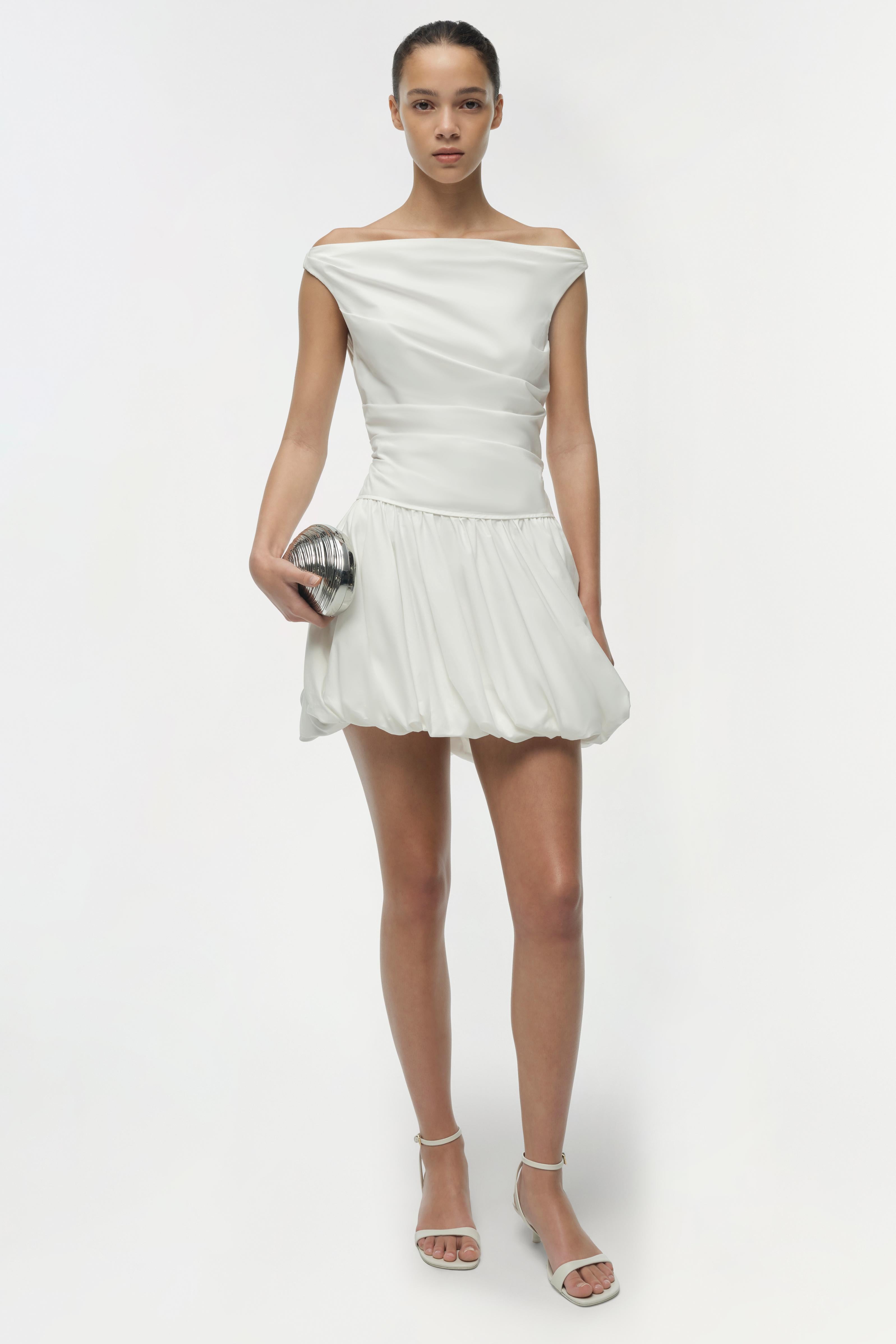 SIMKHAI Salina Cotton Bubble Mini Dress in White SIMKHAI Salina Cotton Bubble Mini Dress in White