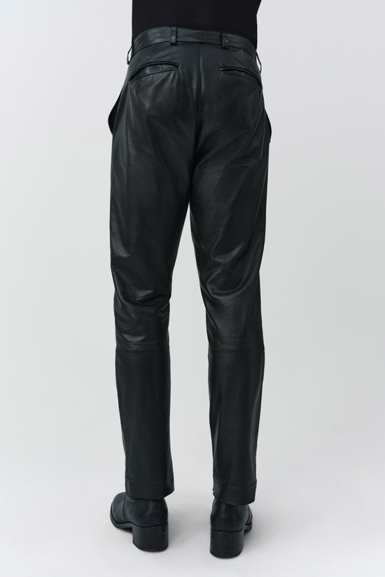Black leather pants with belt loops and back pockets, shown from rear view.