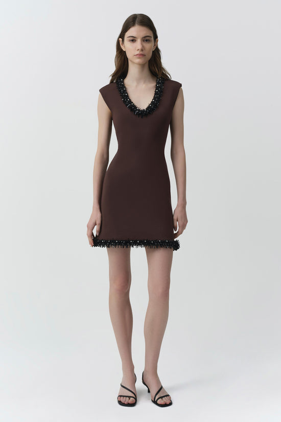 Brown sleeveless mini dress with V-neckline and black beaded trim at neckline and hem.