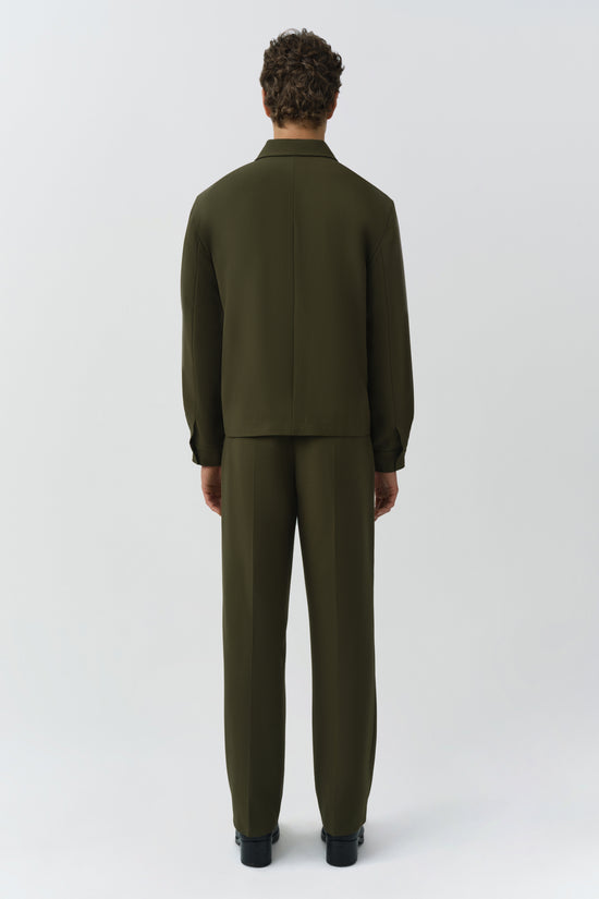 Man wearing olive green Sidney Jacket with matching pants, shown from back view against neutral background.