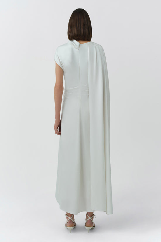 Ivory satin midi dress with short sleeves and flowing cape detail draped down the back.