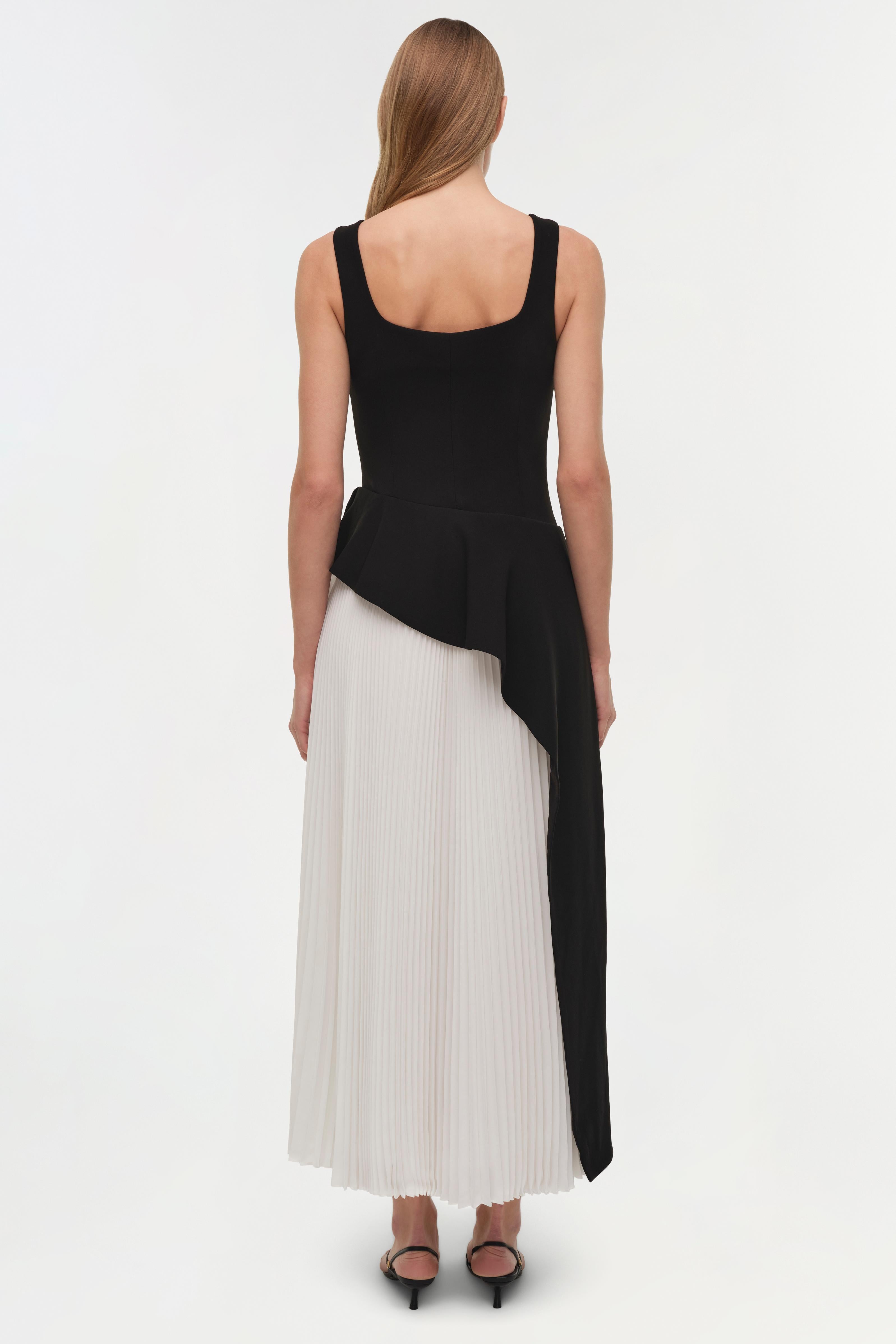 black dress with white pleated skirt Black&White dress with a pleated skirt, Parisienne