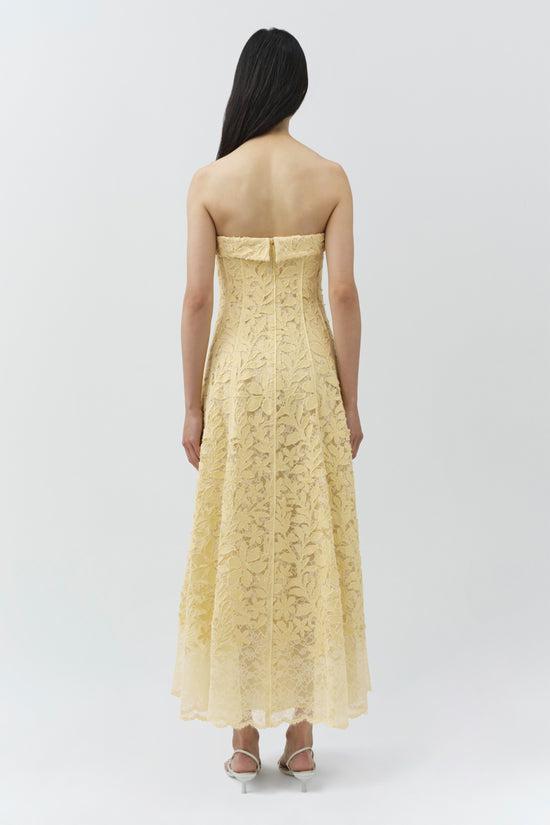 Cream lace bustier midi dress with strapless neckline, shown from back view on model.