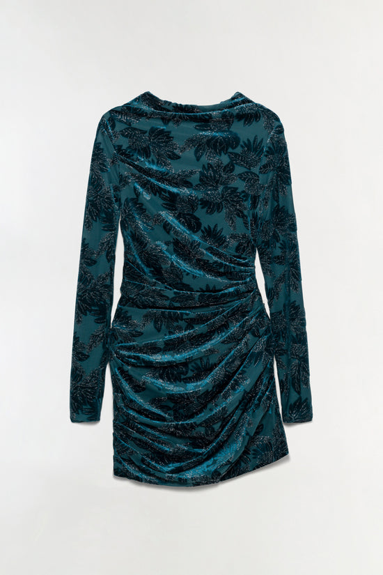 Teal velvet mini dress with black floral pattern, long sleeves, and ruched side detailing.