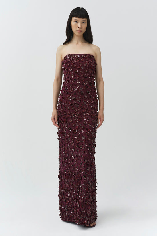 Burgundy strapless floor-length gown with all-over beaded and sequin embellishments throughout.