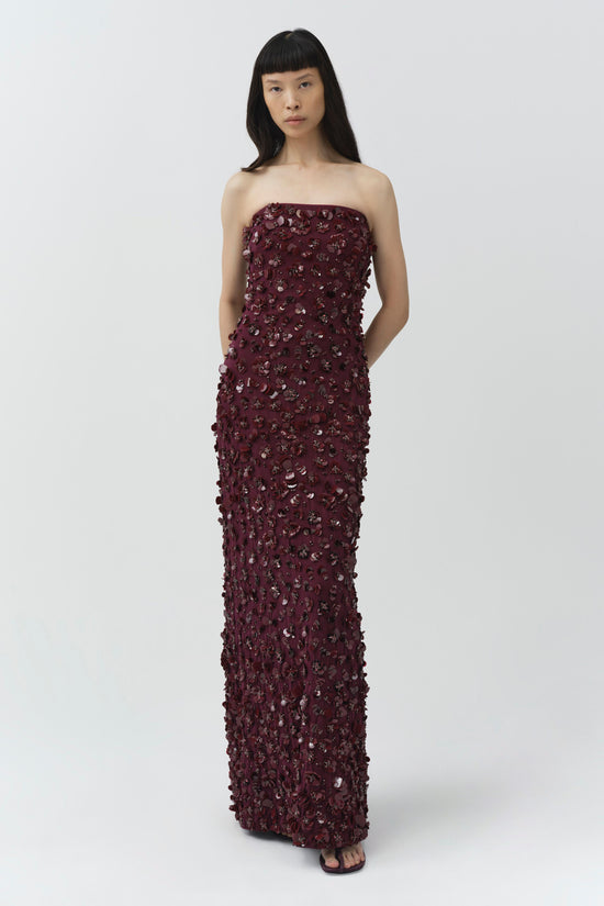 Burgundy strapless gown with all-over sequin and beaded embellishments, floor-length silhouette.