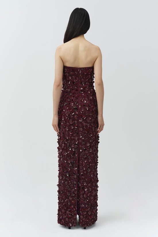 Burgundy strapless gown with sequin and beaded embellishments throughout, shown from back view.