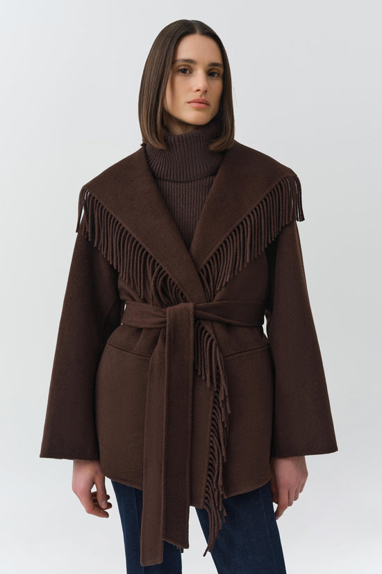 Brown wool jacket with fringe trim on shoulders and hem, wide collar, and tie waist belt.
