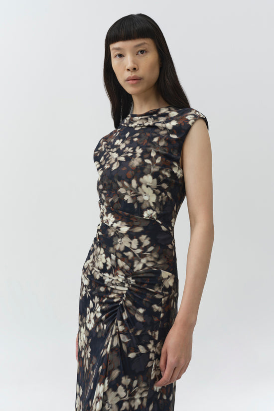 Black and cream floral print sleeveless midi dress with draped ruching along the torso and side gathered details.