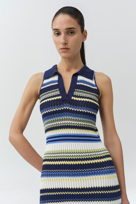 Navy knit midi dress with horizontal stripes in white, blue, and yellow, featuring a collared V-neckline and sleeveless desig