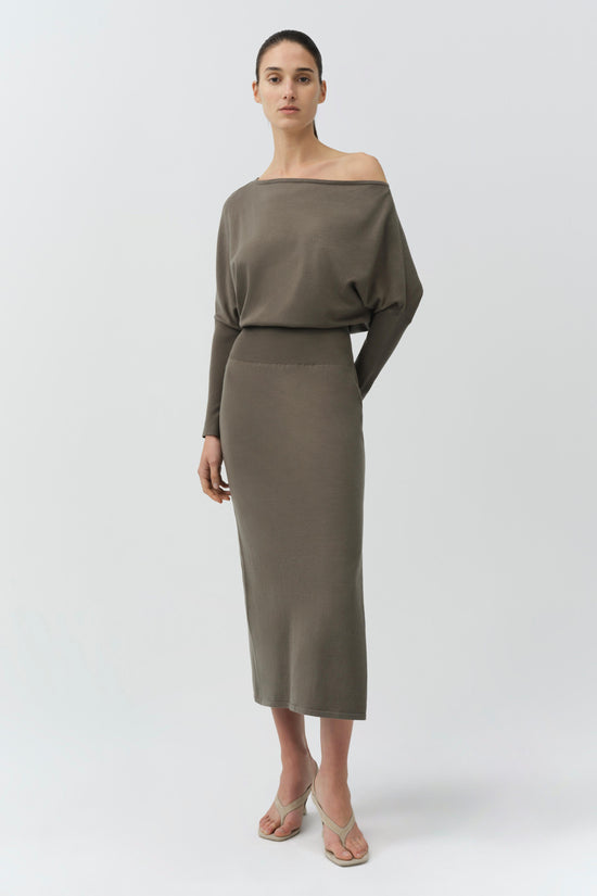 Taupe knit midi dress with off-shoulder neckline and long sleeves on model.
