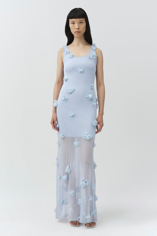 Light blue sleeveless midi dress with three-dimensional floral appliqués scattered throughout, sheer mesh lower section.
