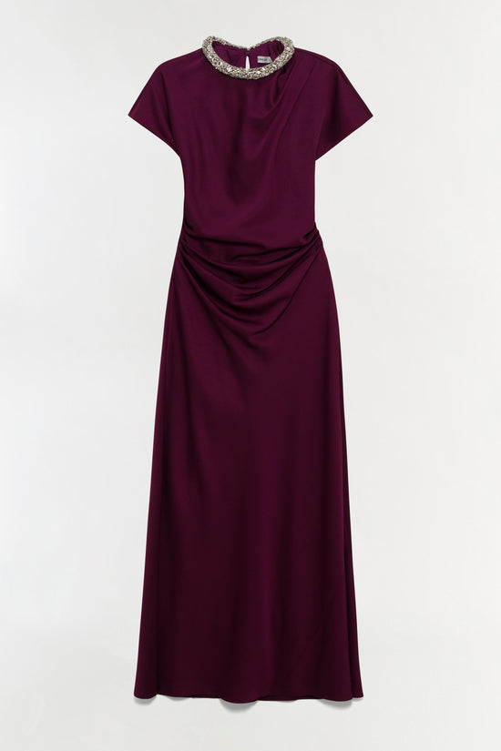 Deep purple satin gown with short sleeves, beaded round neckline, and ruched side detailing.