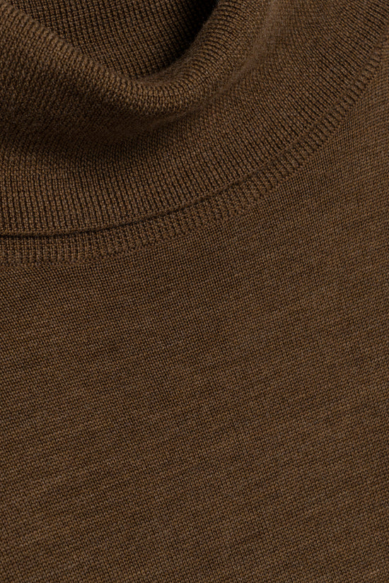Brown merino wool turtleneck with ribbed knit texture and high neckline.