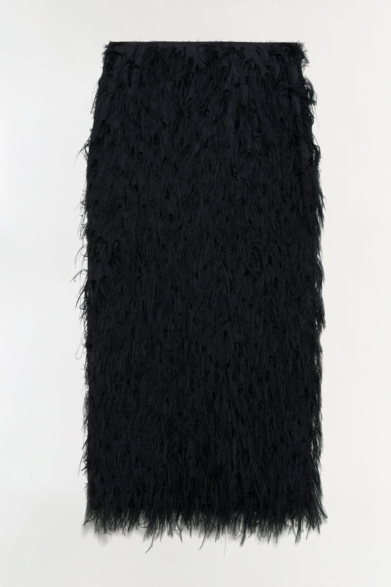 Black midi skirt with fringe trim throughout and textured jacquard fabric.