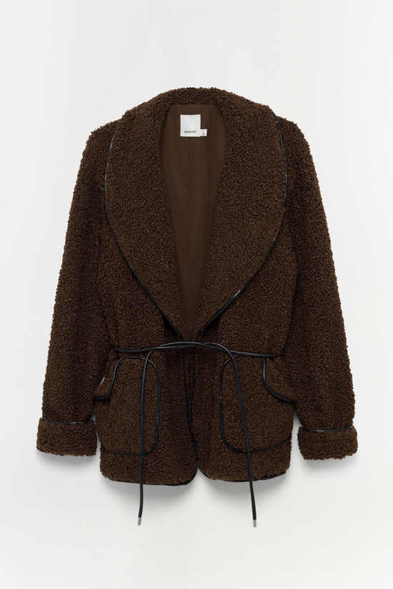 Brown textured blazer with notched lapels, tie waist belt, and rolled cuffs displayed on neutral background.