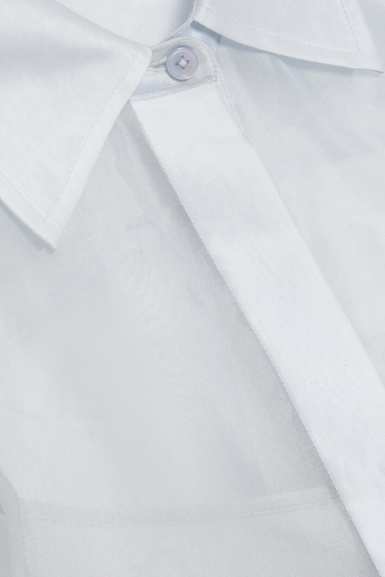 White organza shirt with collar, button front closure, and draped fabric detail.