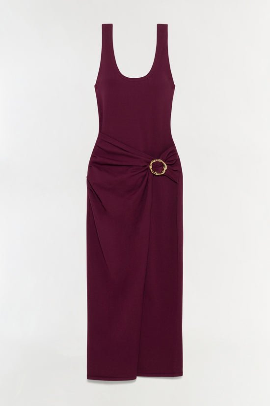 Burgundy sleeveless midi dress with draped waist detail and gold circular buckle accent.