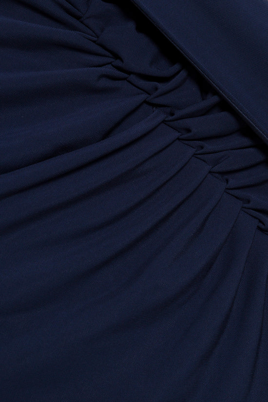 Dark navy jersey fabric with draped and gathered detailing across the bodice.