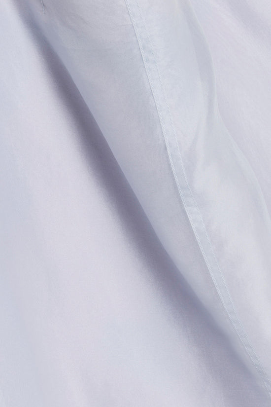 Lavender organza midi skirt with flowing folds and side seam detail.