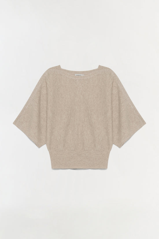 Beige cashmere dolman boxy tee with short wide sleeves and crew neckline displayed on neutral background.