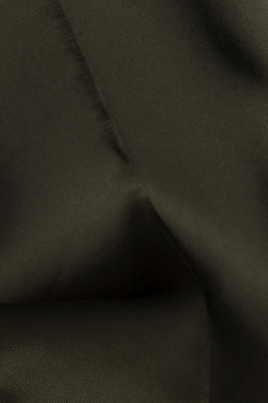 Olive green satin fabric with draped folds showing the smooth, lustrous texture of the material.