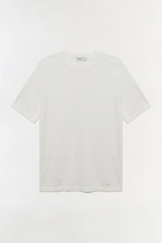 Cream short-sleeve t-shirt with crew neckline and relaxed fit against a neutral background.