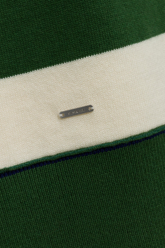 Green and cream striped knit popover with metal brand tab detail on front.