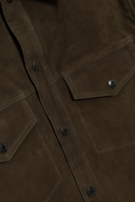 Olive suede jacket with front utility pockets, metal snap buttons, and topstitched details.