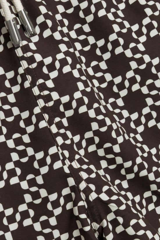 Brown and white checkered swim shorts with drawstring closure and metal eyelets.