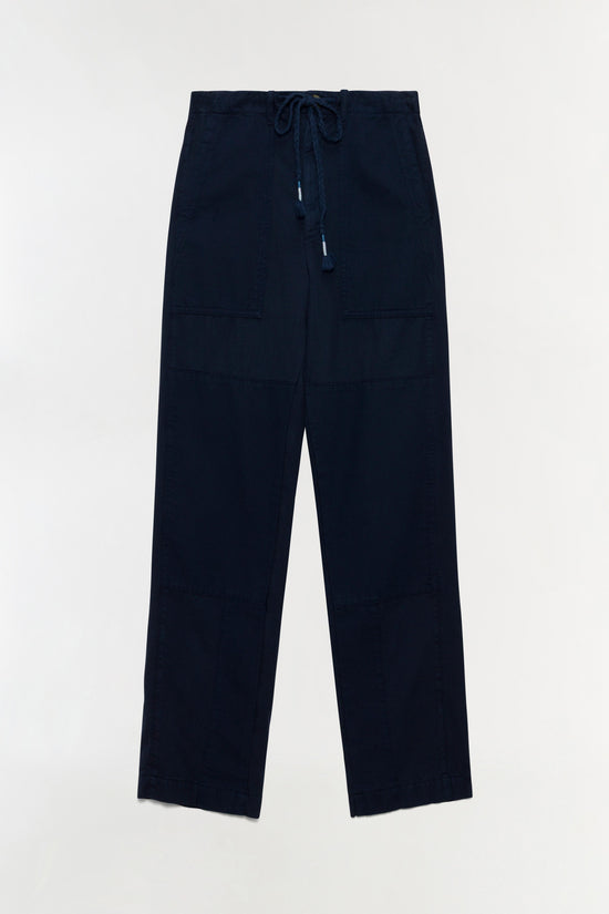 Navy utility pant with drawstring waist and horizontal seam details across legs.