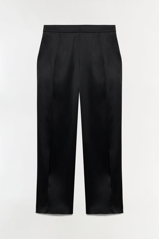 Black satin pants with side slits at the ankles and pleated front detail.