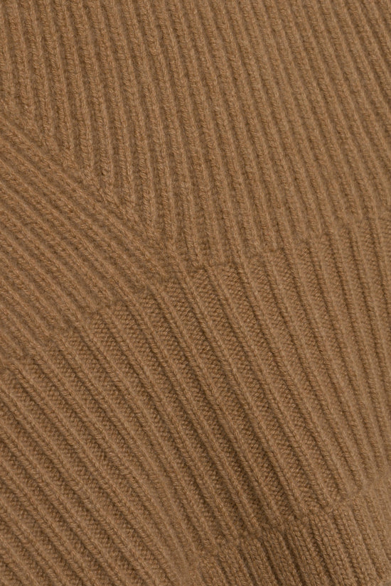 Tan ribbed knit fabric with vertical texture pattern.