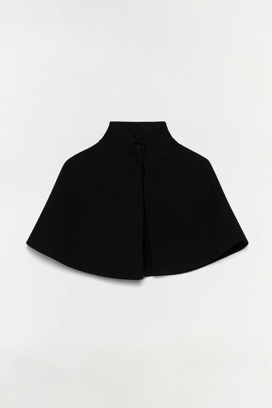 Black knit cape with high collar and button front closure.