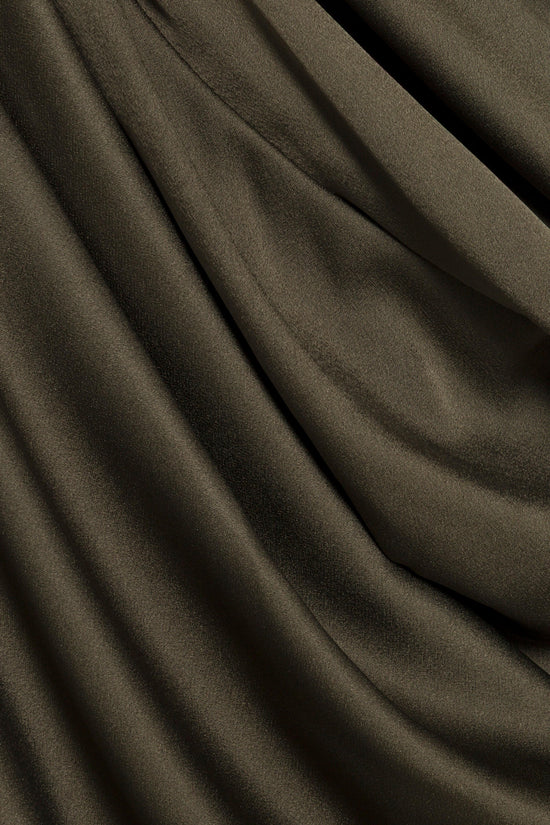 Olive-green satin fabric with soft draped folds and subtle sheen.