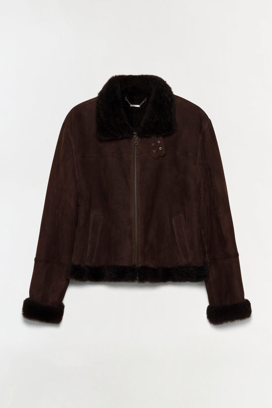 Brown suede jacket with black shearling collar, cuffs, and hem trim, front zip closure, and chest pocket detail.