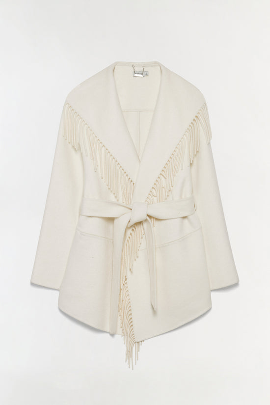 Cream-colored jacket with large fringe trim on the front and side, tied waist belt, and notched lapels.