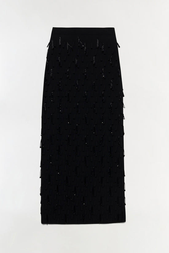 Black knit midi skirt with all-over beaded embellishments and tiered fringe details.