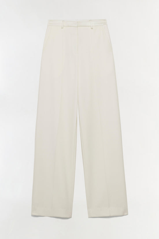Cream-colored straight leg pants with flat front and belt loops, displayed on neutral background.