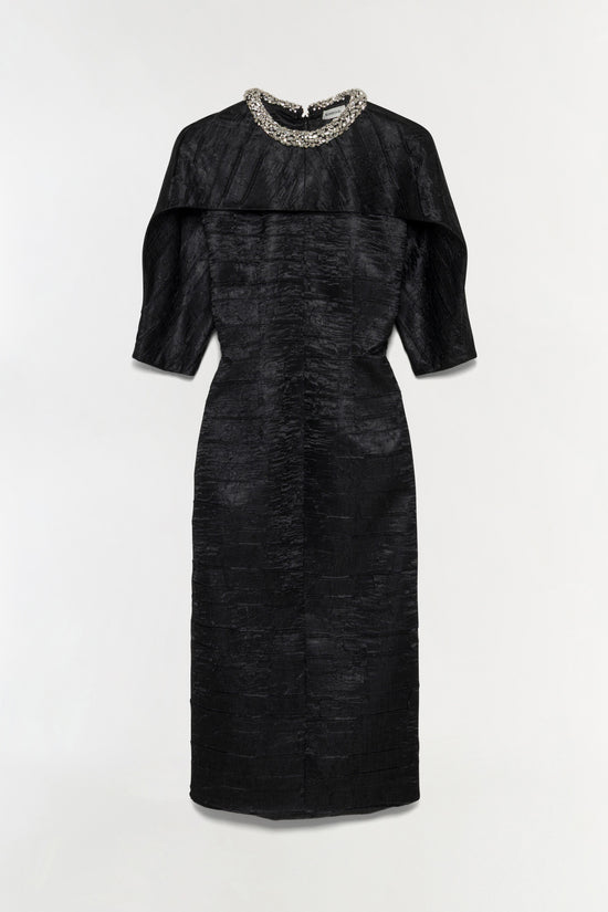 Black satin midi dress with beaded neckline, half sleeves, and draped shoulder detail.