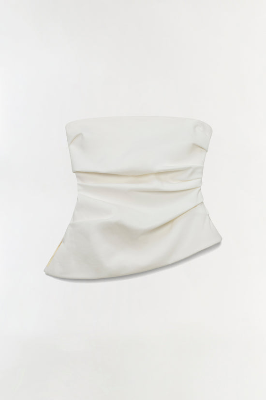 White strapless bustier top with ruched detailing across the torso.