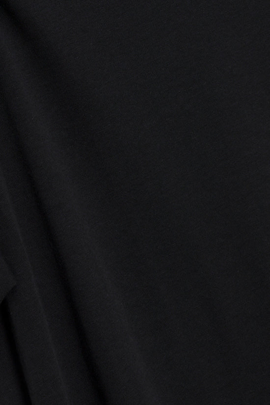 Black cotton V-neck shirt with ribbed texture detail.