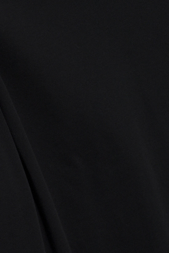 Black crewneck sweatshirt with ribbed texture and folded fabric visible on the left side.