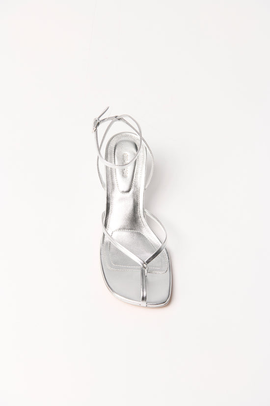 Silver leather strappy wedge sandal with ankle strap and square toe, shown from above.