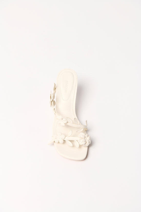 Cream leather strappy sandal with ruched detail across the foot and ankle strap, shown from above.