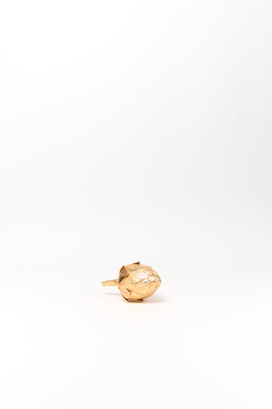Gold-toned metallic artichoke-shaped clutch with textured segmented surface and stem detail.